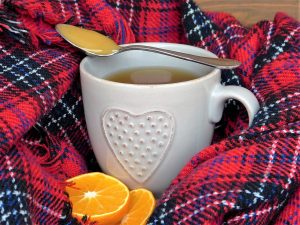 Hot cup of tea with honey and lemon