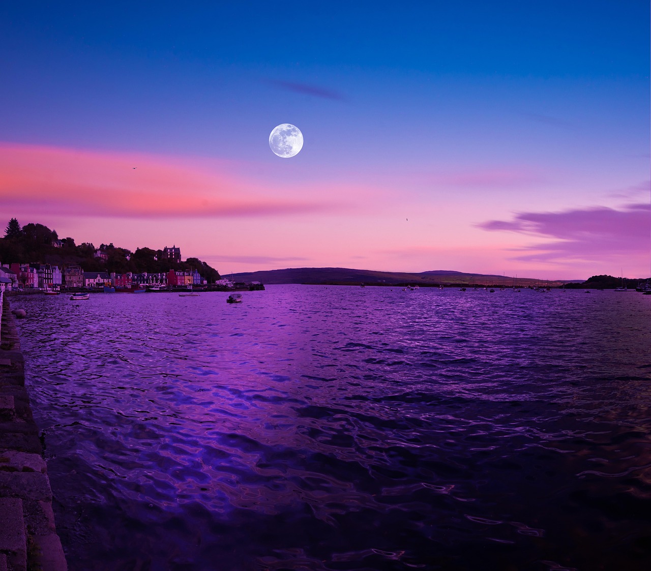 Full moon in a summer evening sky