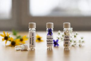 an image of 3 small bottles of homopathic remedies