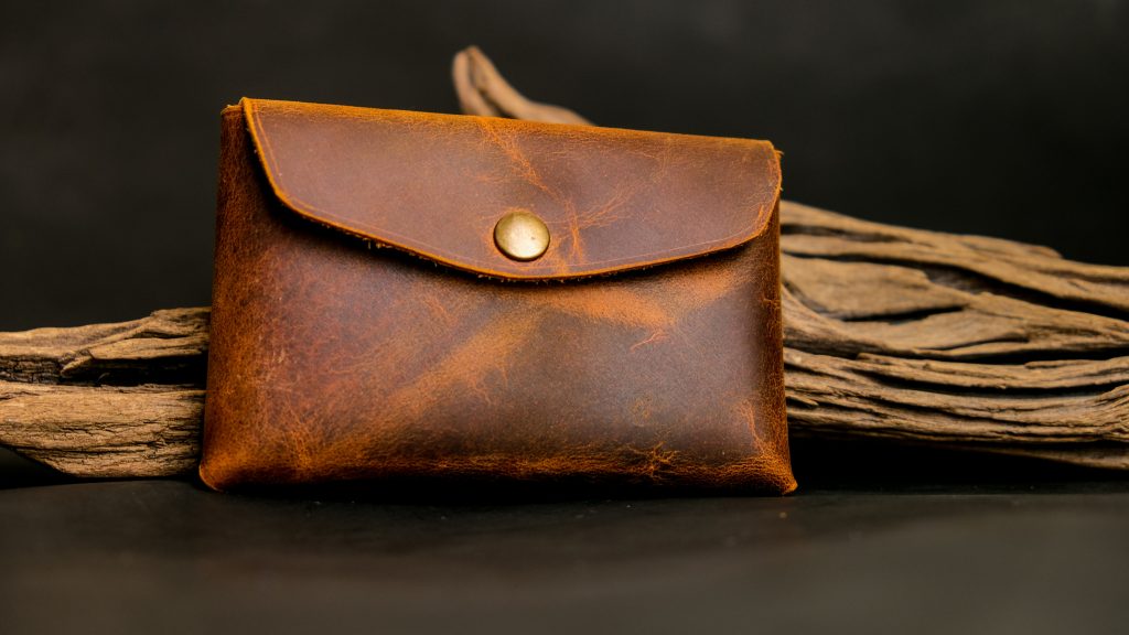 A small brown leather remedy kit bag